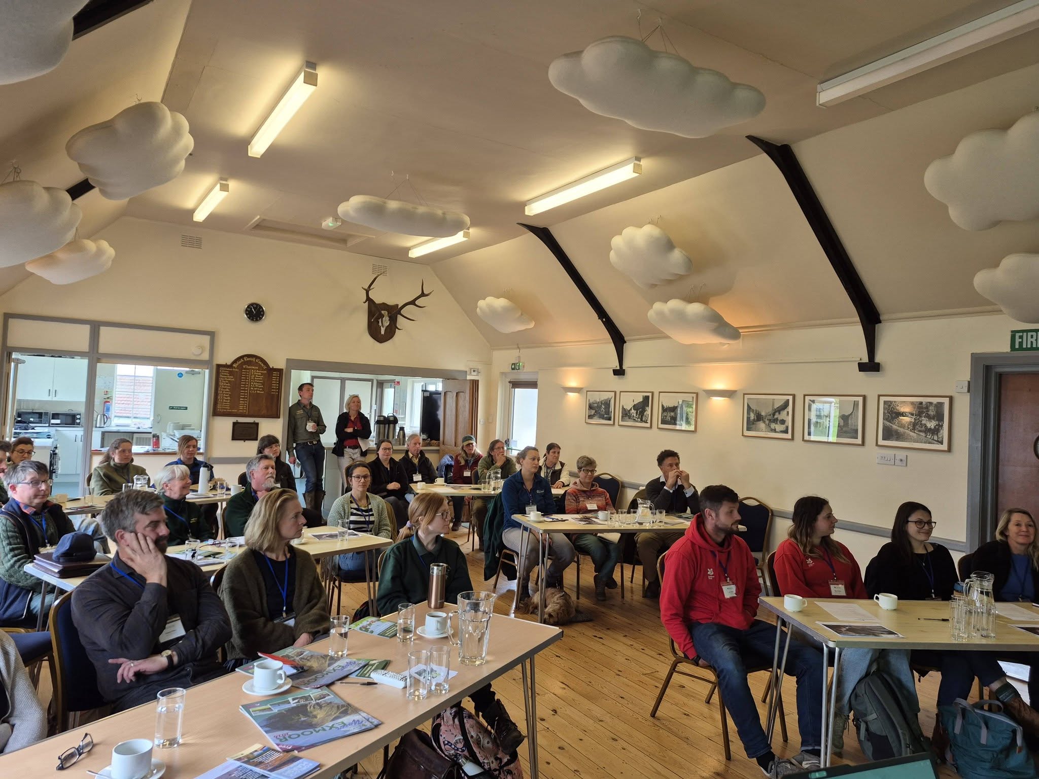 Participants listening to a training presentation