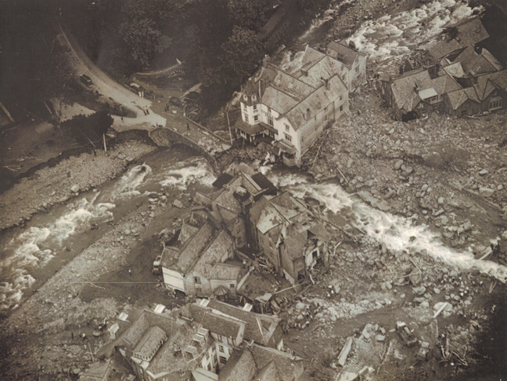 Black and White aerial photo showing damage caused by flood in Lynmouth