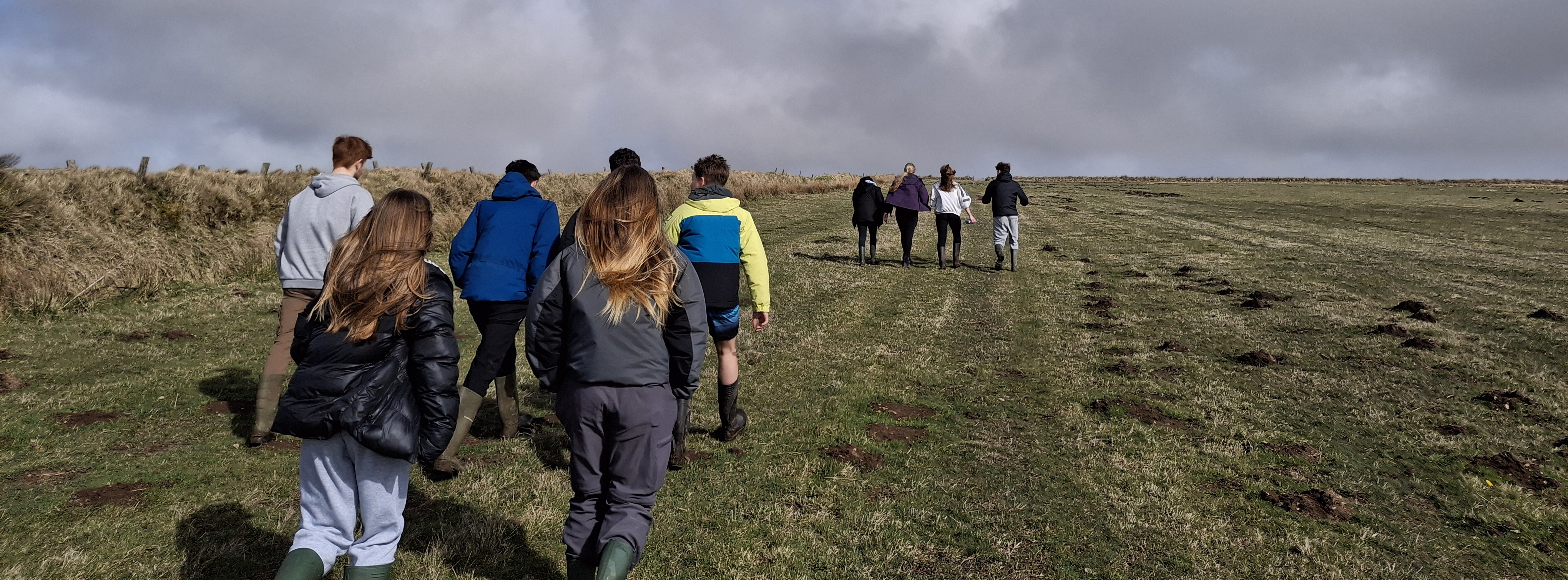 Young Rangers Walking on Moorland